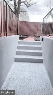 a view of entryway with a front door