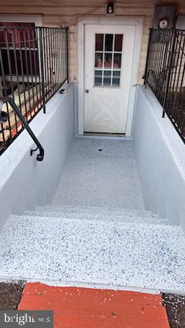 9119 Aspenpark Court Lorton, VA 22079 - Photo 30 of 32 a view of an empty room with wooden floor