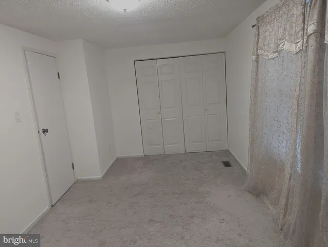 a kitchen with a sink stove and refrigerator