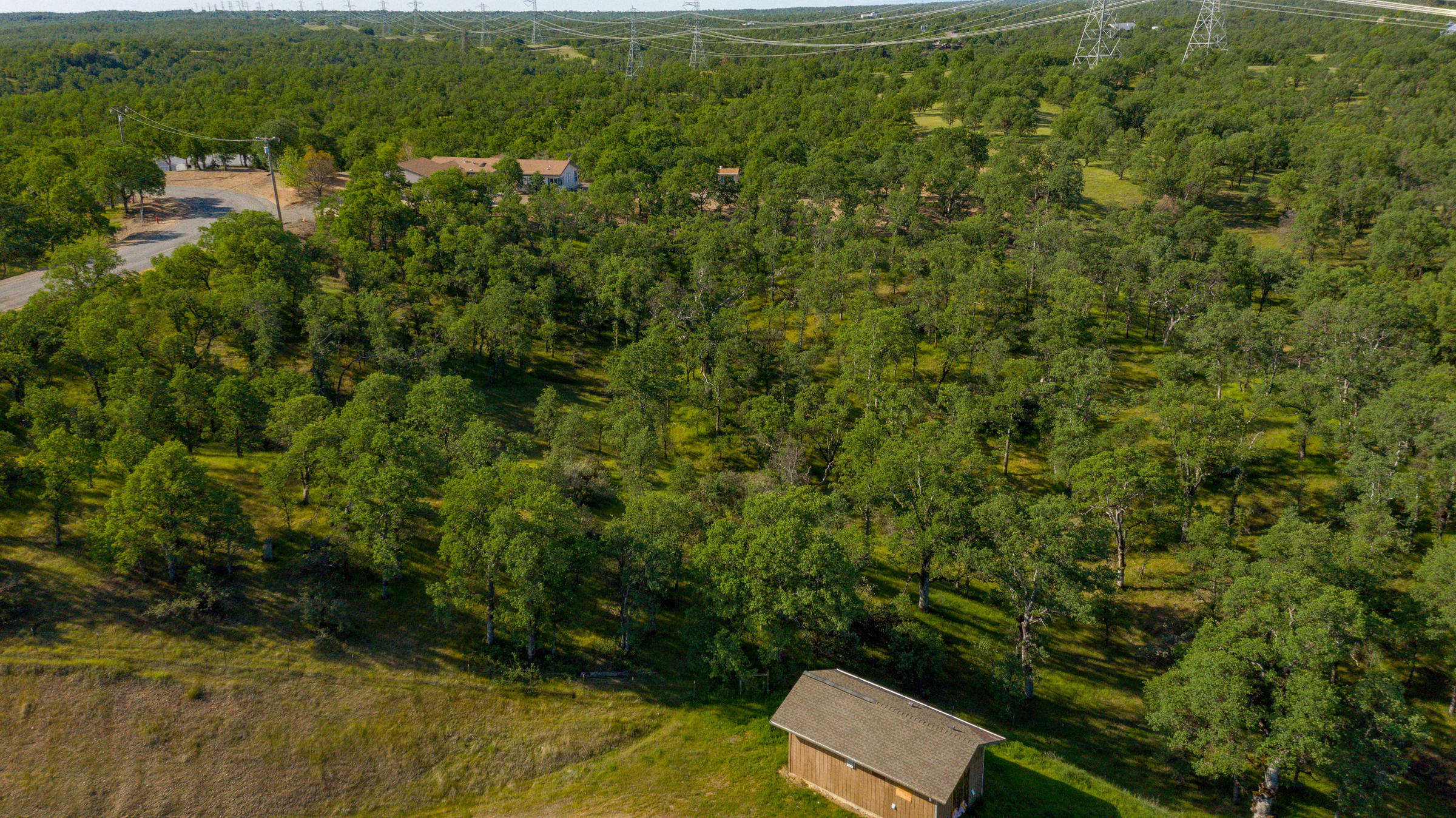 18623 Saddleback Ridge Loop Cottonwood, CA 96022 - Photo 15 of 28 a view of a yard with an outdoor seating