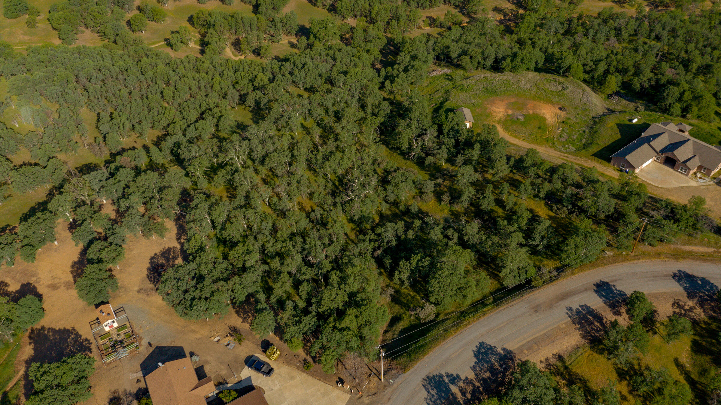 18623 Saddleback Ridge Loop Cottonwood, CA 96022 - Photo 2 of 28 an aerial view of a houses with a yard