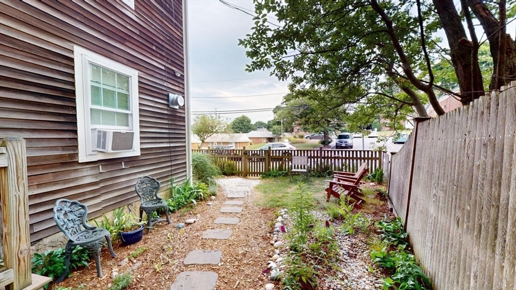 57 Green Street Marblehead, MA 01945 - Photo 27 of 29 a view of a backyard with sitting area