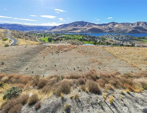 a view of a lake with mountains in the background