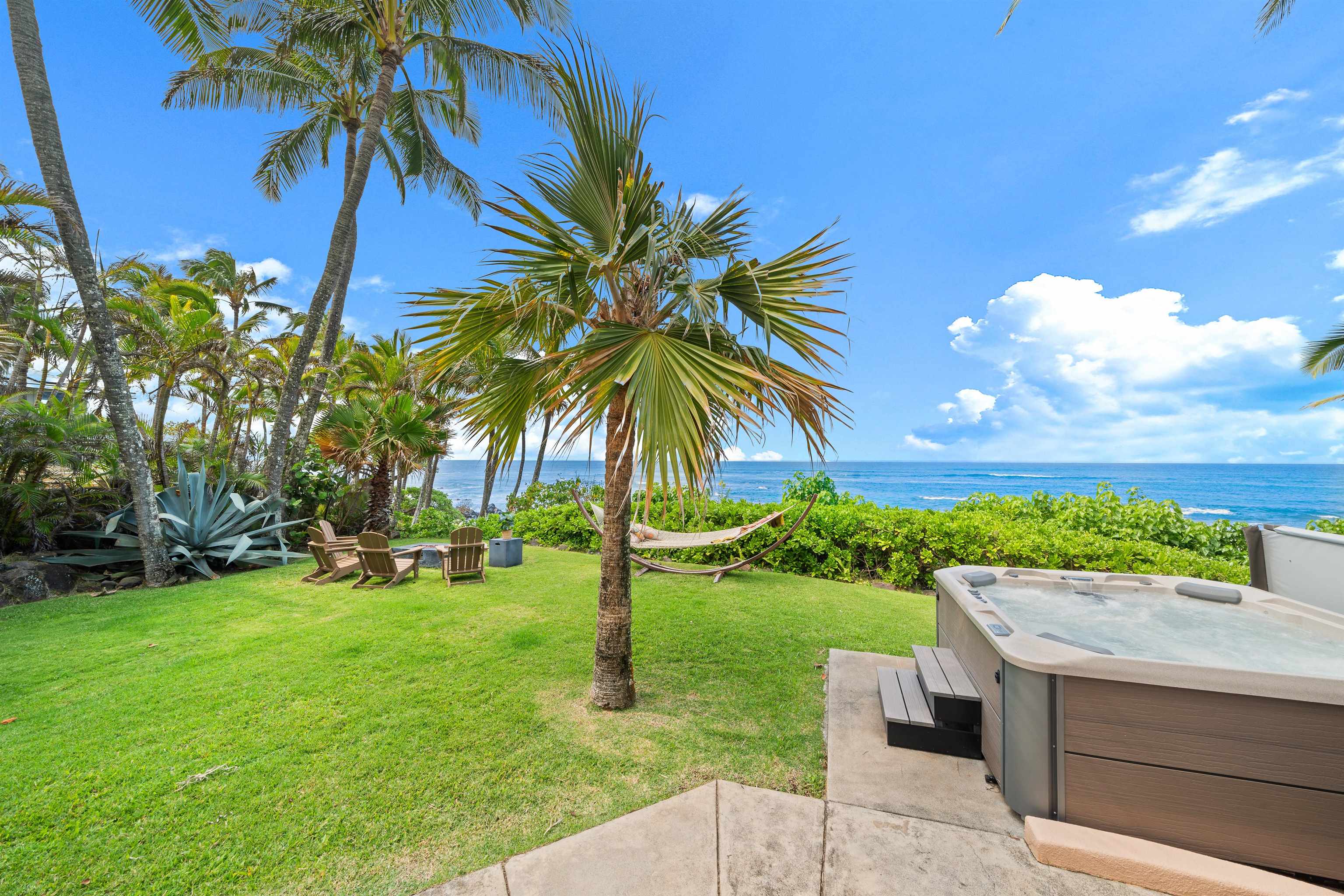 111 Aleiki Place Paia, HI 96779 - Photo 31 of 50 a view of a backyard with a garden and entertaining space