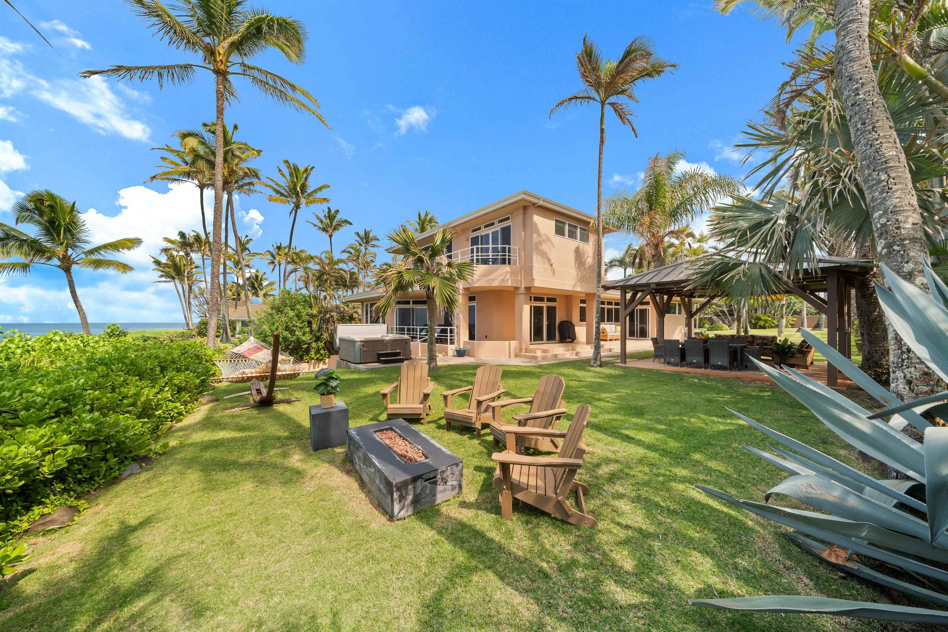 111 Aleiki Place Paia, HI 96779 - Photo 39 of 50 a view of a house with a yard