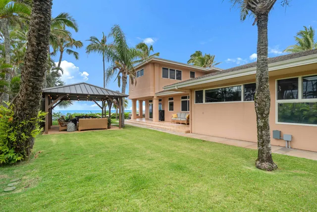 a view of a backyard with a garden