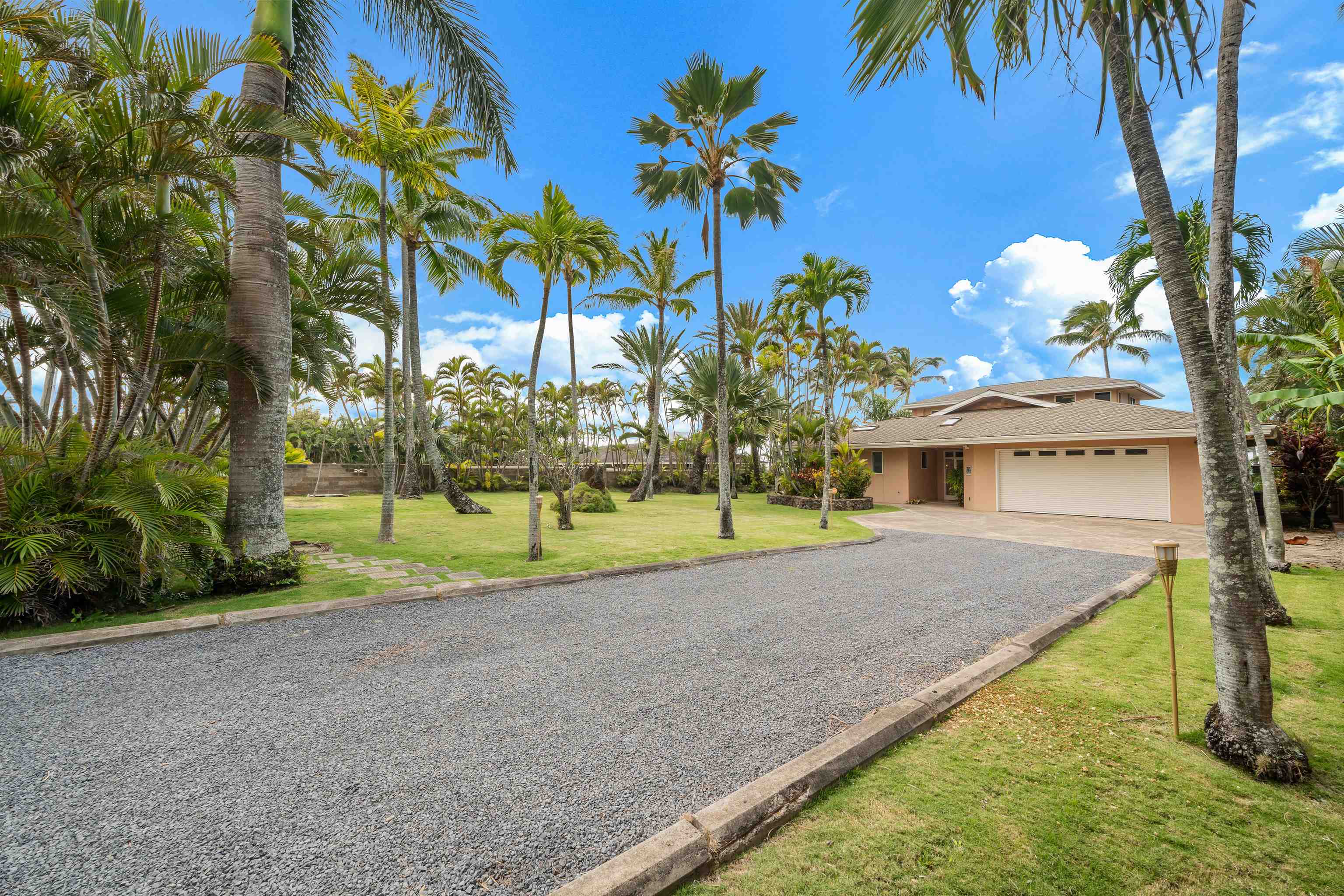 111 Aleiki Place Paia, HI 96779 - Photo 50 of 50 a view of a house with a backyard and a tree