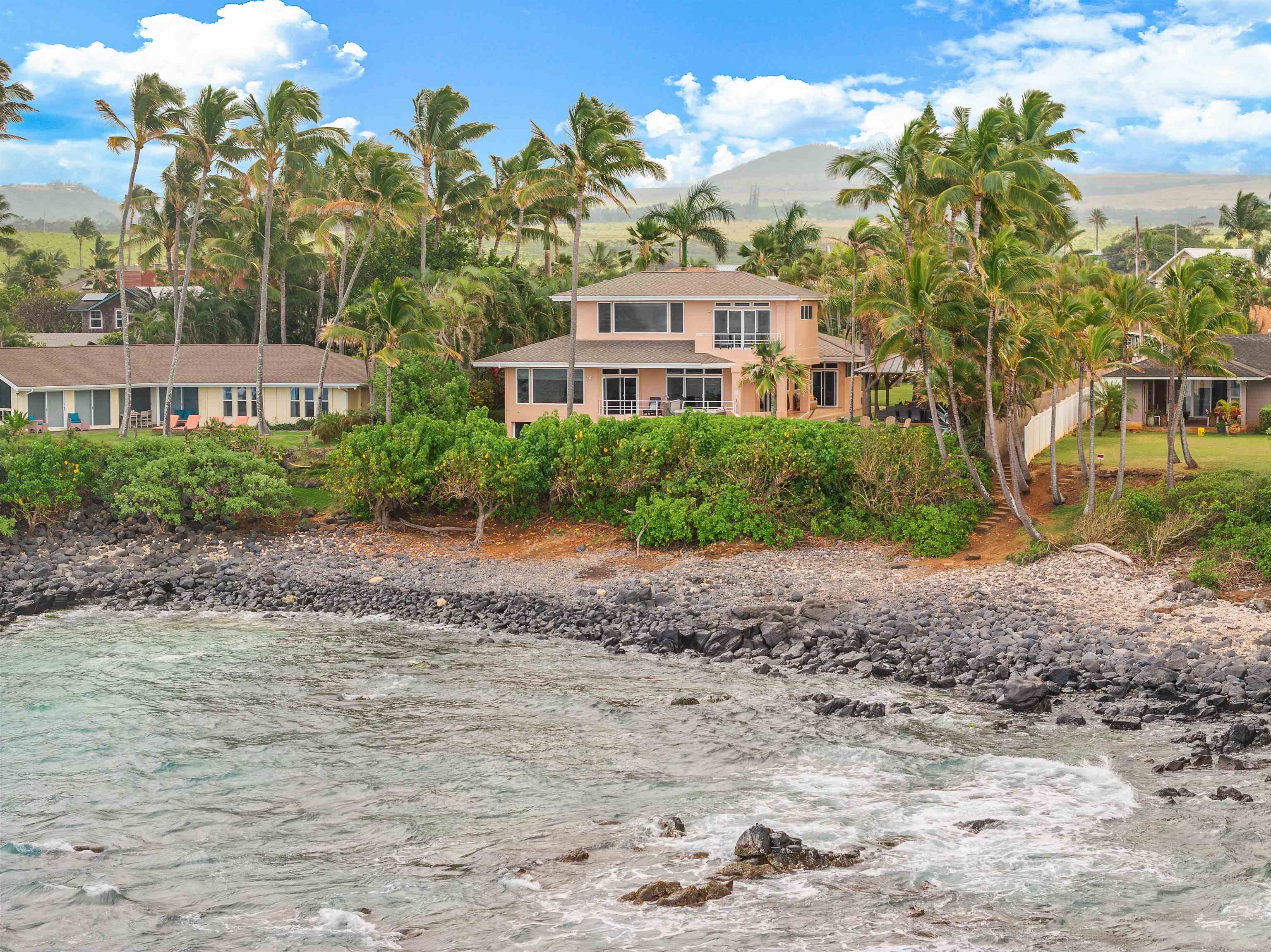 111 Aleiki Place Paia, HI 96779 - Photo 10 of 50 a view of a front of a house with a yard