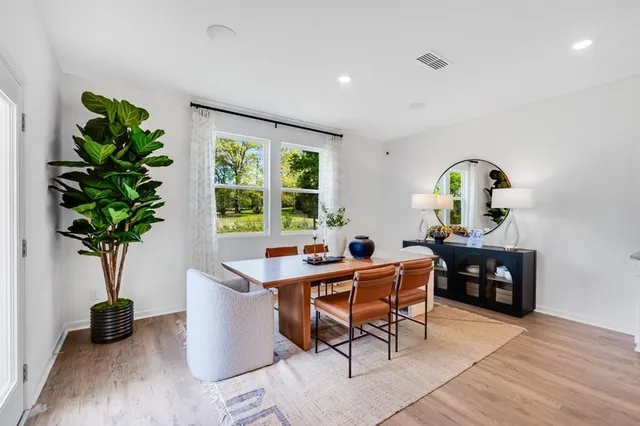 a view of a hallway with windows