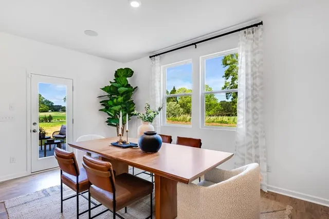 a bathroom with a sink mirror and toilet