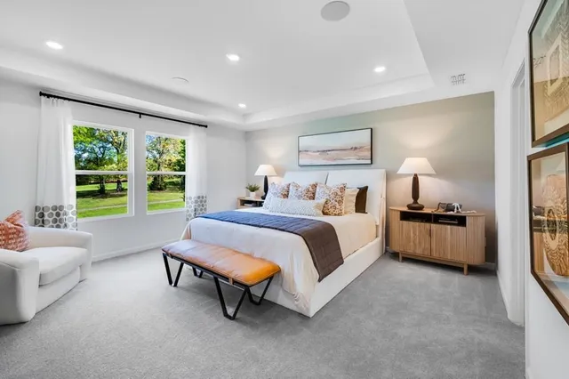 a en suite bathroom with a double sink and mirror