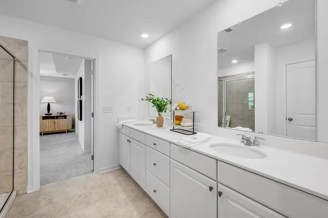 a bedroom with bed and window