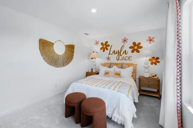 a view of a house with a yard and table and chairs