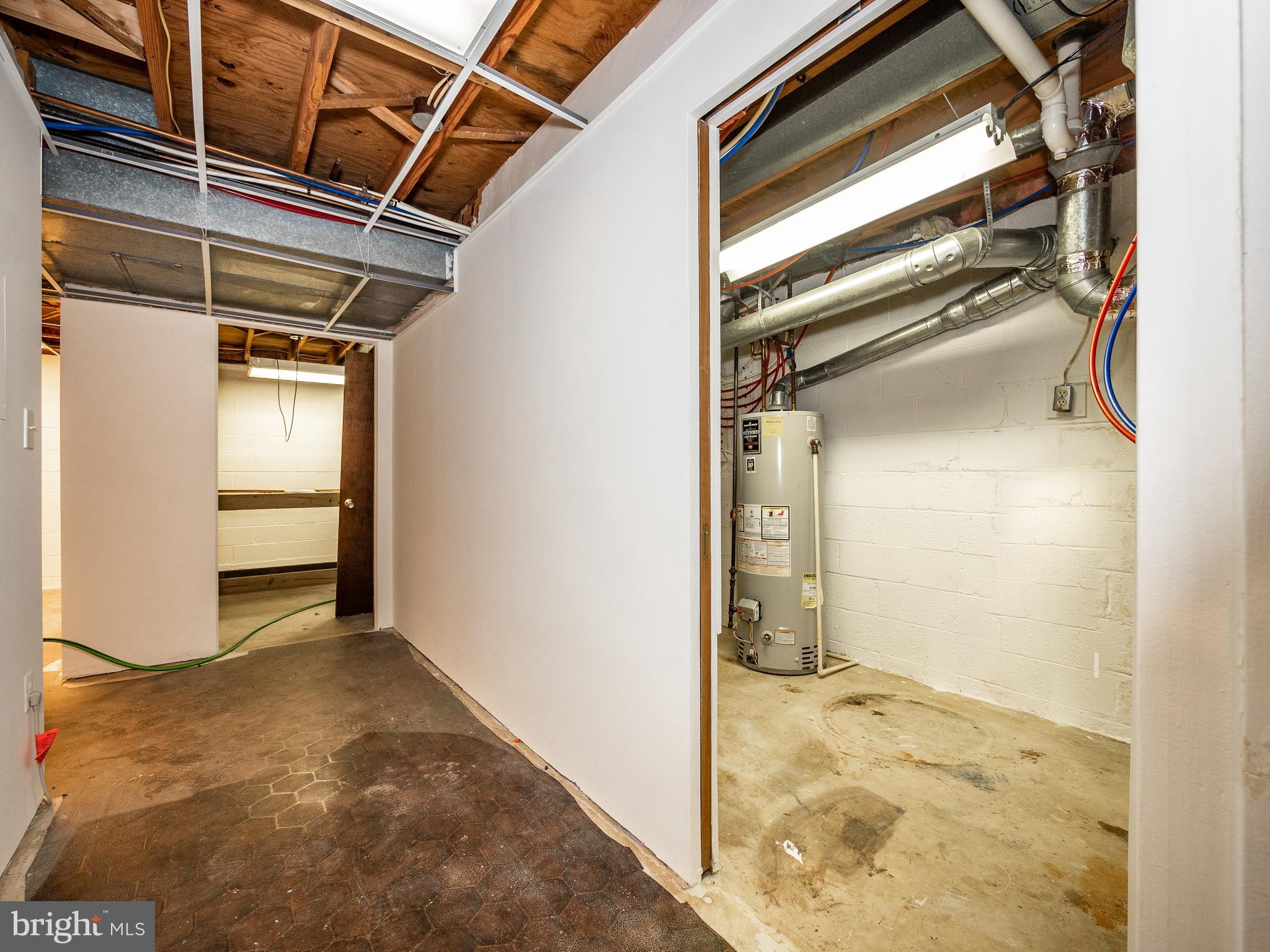 10124 Spring Pools Lane Columbia, MD 21044 - Photo 25 of 30 Somewhat finished basement with lots of rooms
