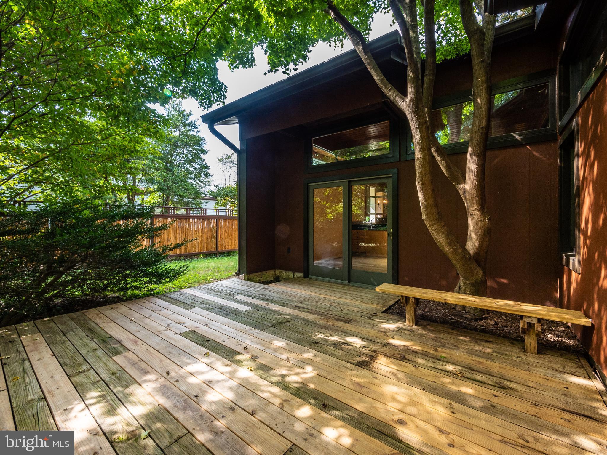 10124 Spring Pools Lane Columbia, MD 21044 - Photo 30 of 30 Serene back decking with access from Liv/Din rooms