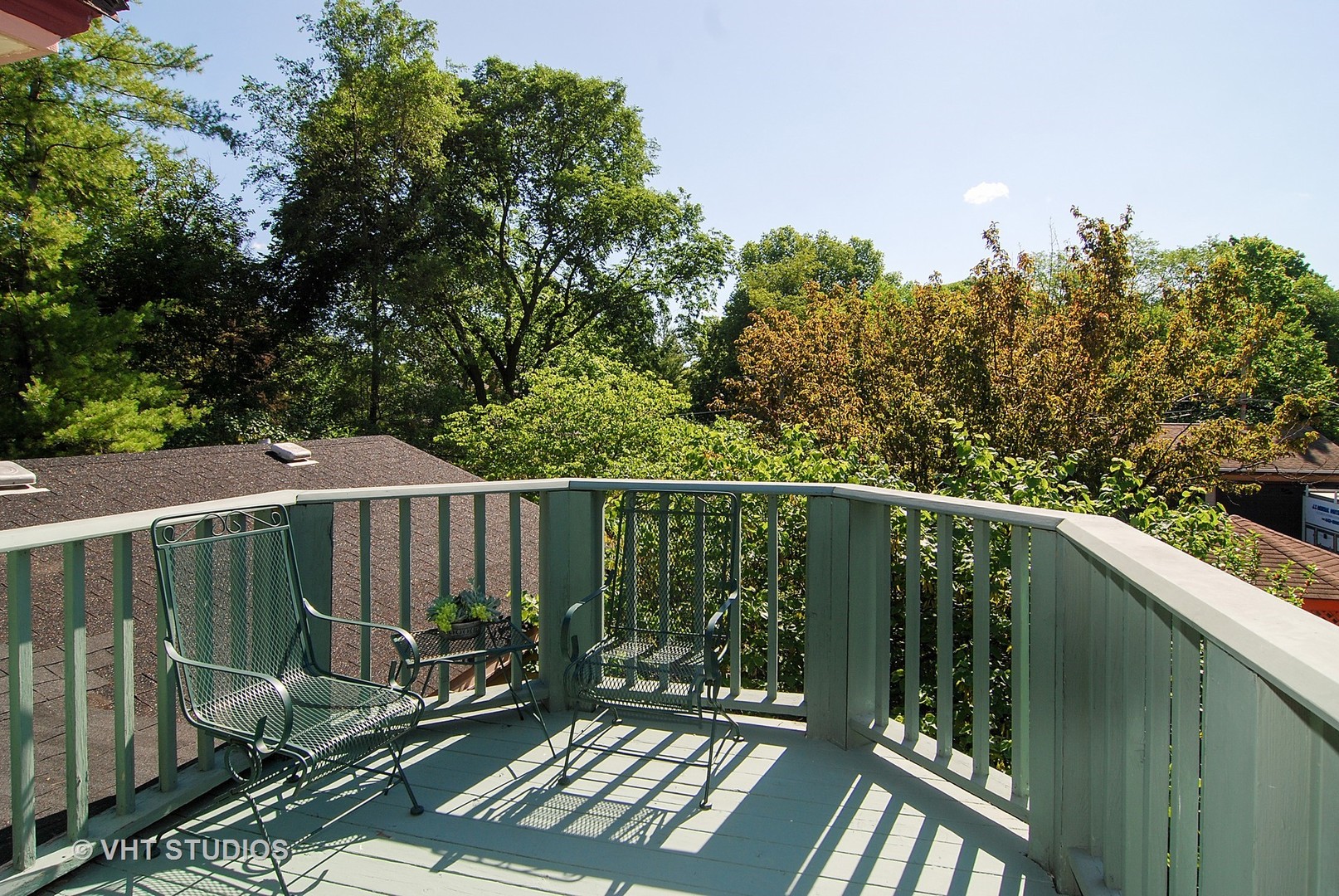 145 Woodside Road Riverside, IL 60546 - Photo 12 of 26 a balcony with wooden floor