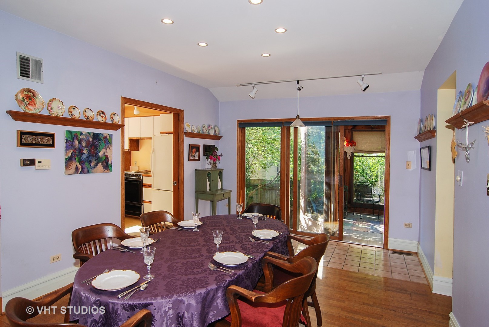 145 Woodside Road Riverside, IL 60546 - Photo 5 of 26 a view of a dining room with furniture a chandelier and wooden floor