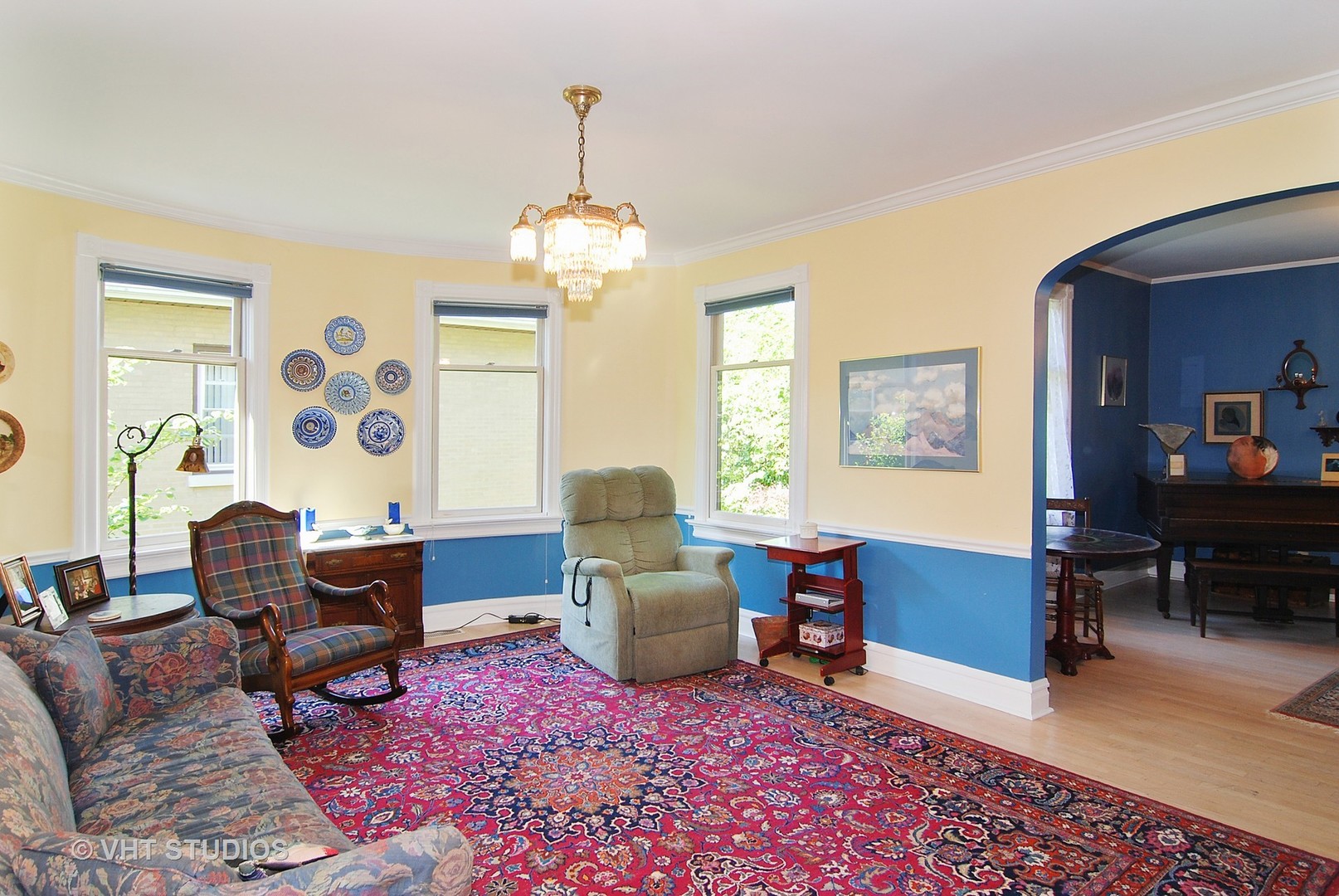 145 Woodside Road Riverside, IL 60546 - Photo 6 of 26 a living room with furniture and a chandelier