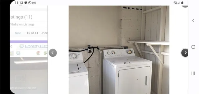 a view of a bedroom from a hallway