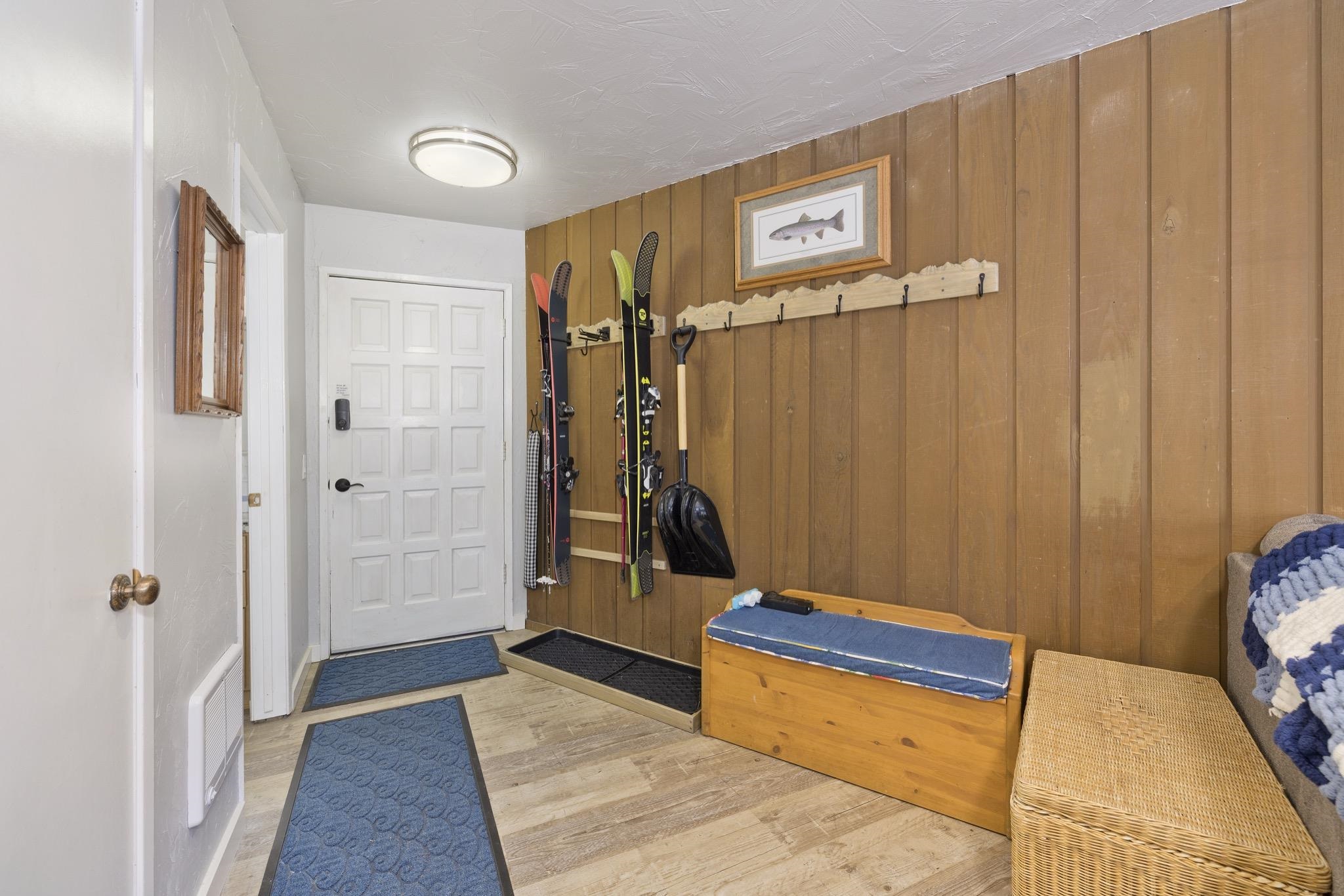 286 Old Mammoth Road, Unit 37 Mammoth Lakes, CA 93546 - Photo 2 of 33 Mudroom with light wood-style flooring and wooden walls