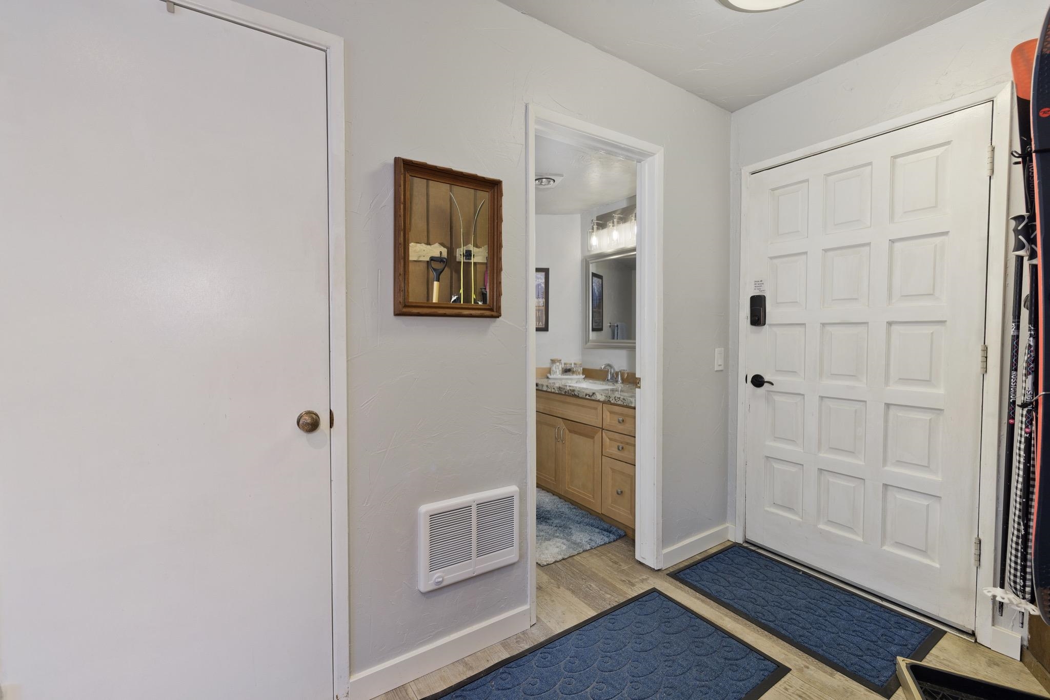 286 Old Mammoth Road, Unit 37 Mammoth Lakes, CA 93546 - Photo 4 of 33 Foyer with light wood-type flooring and heating unit