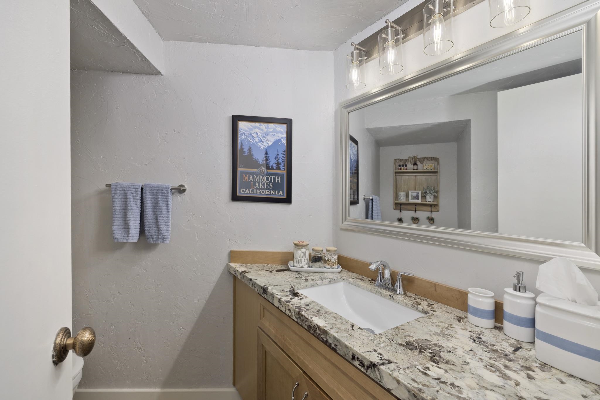 286 Old Mammoth Road, Unit 37 Mammoth Lakes, CA 93546 - Photo 5 of 33 Bathroom with vanity and a textured wall