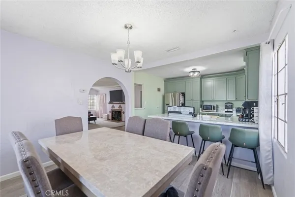 a view of a dining room with furniture