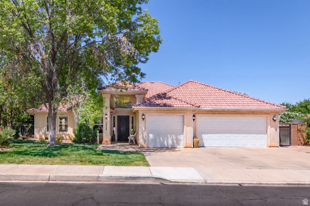 3034 Swiss Drive Santa Clara, UT 84765 - Photo 4 of 59 Stucco exterior with a terracotta tile roof