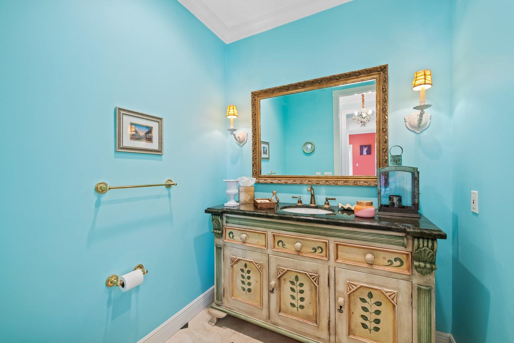 2342 Northeast 26th Street Lighthouse Point, FL 33064 - Photo 20 of 33 a bathroom with a sink mirror and vanity