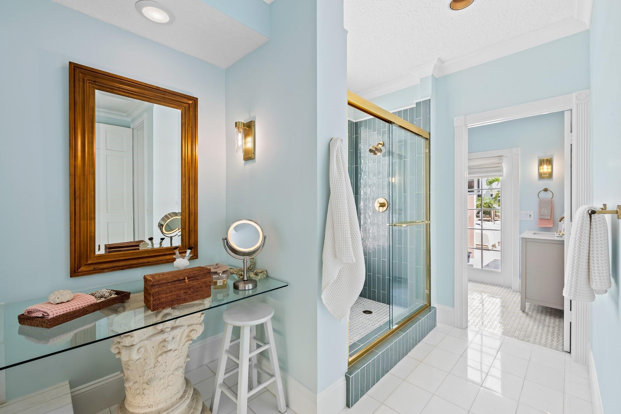 2342 Northeast 26th Street Lighthouse Point, FL 33064 - Photo 21 of 45 a bathroom with a tub a sink and a mirror