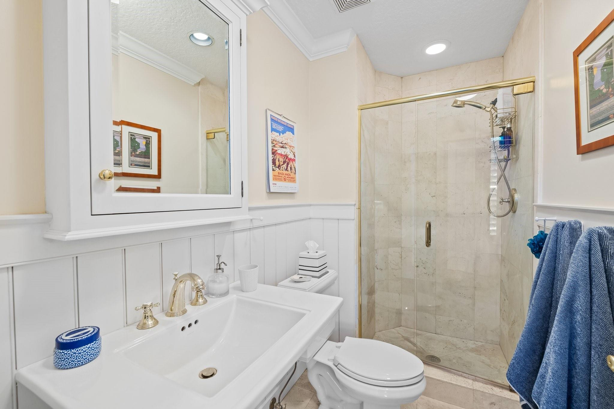 2342 Northeast 26th Street Lighthouse Point, FL 33064 - Photo 29 of 45 a bathroom with a sink toilet and shower