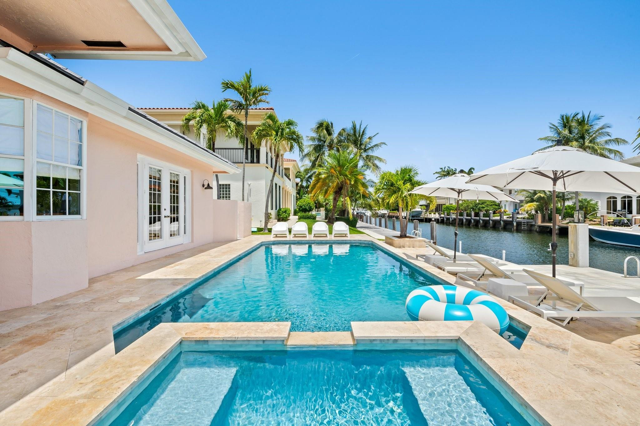 2342 Northeast 26th Street Lighthouse Point, FL 33064 - Photo 4 of 33 a view of swimming pool with a lounge chair