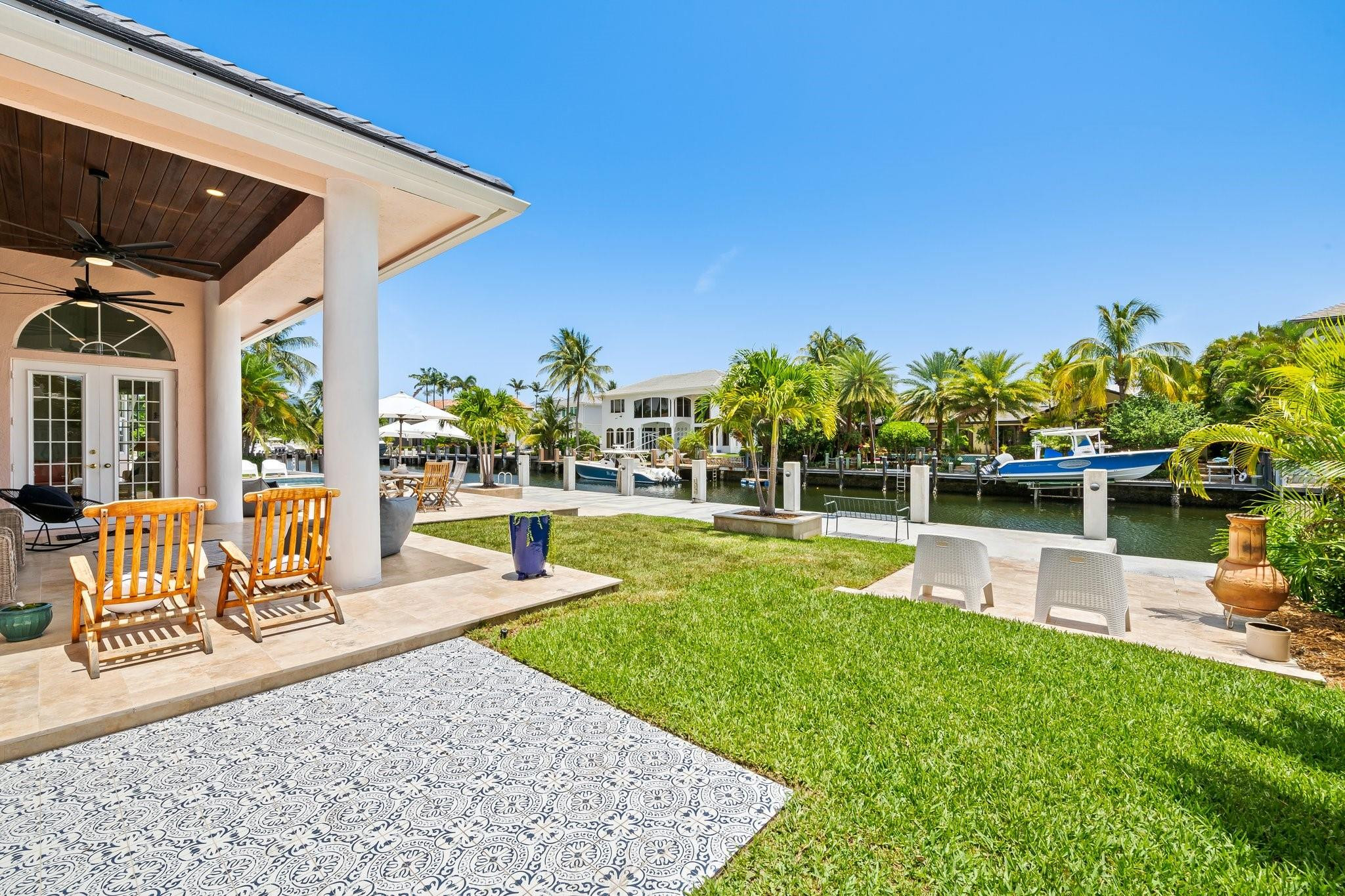 2342 Northeast 26th Street Lighthouse Point, FL 33064 - Photo 8 of 45 a view of a swimming pool with a patio