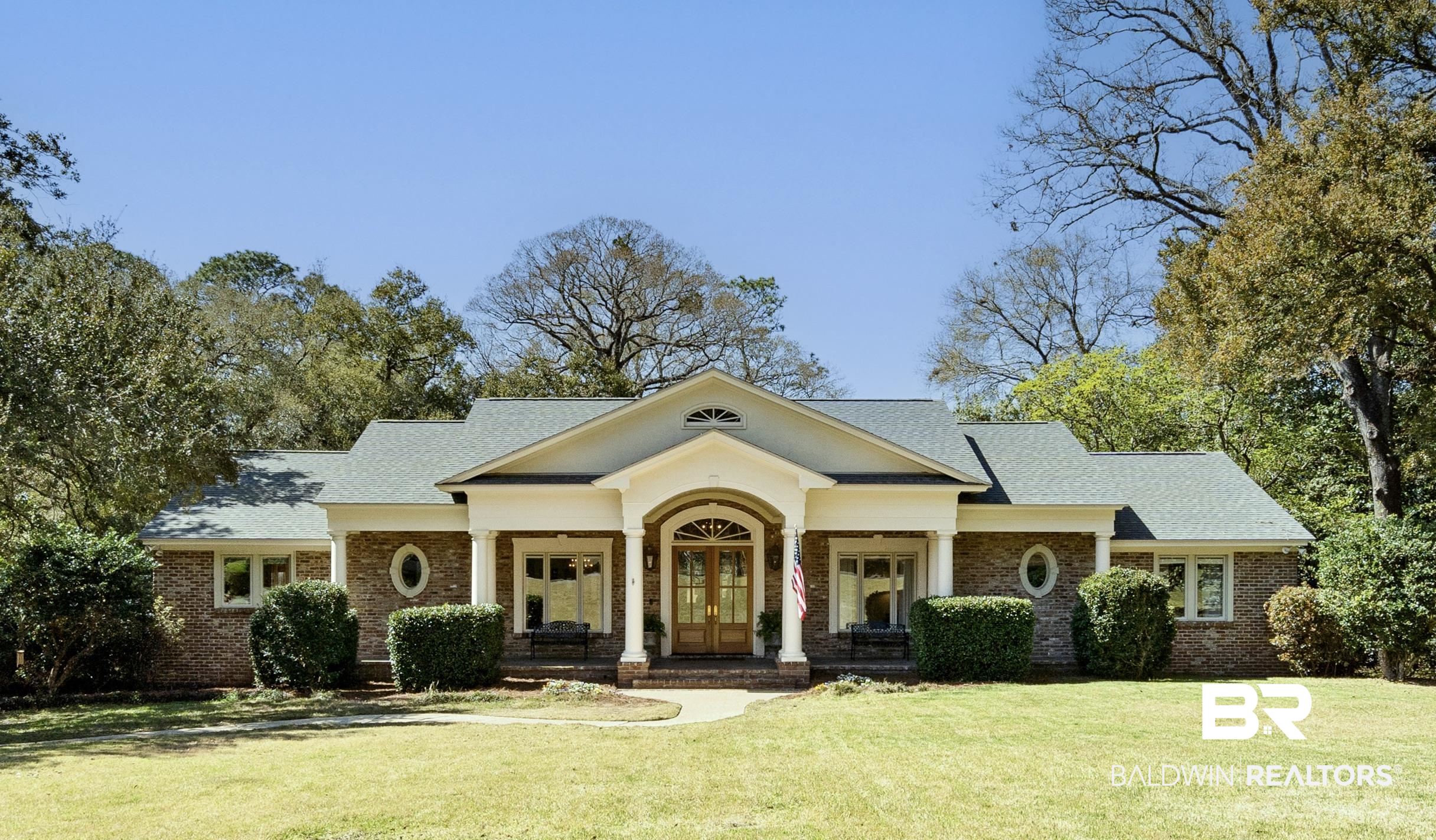 4 Kingsway Mobile, AL 36608 - Photo 42 of 44 Greek revival inspired property with french doors, brick siding, a front yard, and covered porch