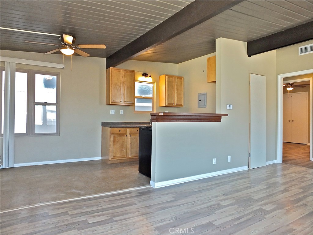 17031 7th Street, Unit A Sunset Beach, CA 90742 - Photo 17 of 27 a view of a kitchen with a dishwasher and a window