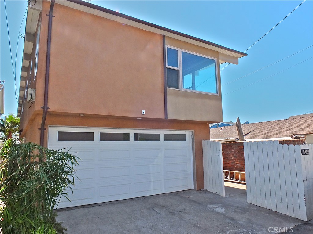 17031 7th Street, Unit A Sunset Beach, CA 90742 - Photo 3 of 27 a view of a house with a space
