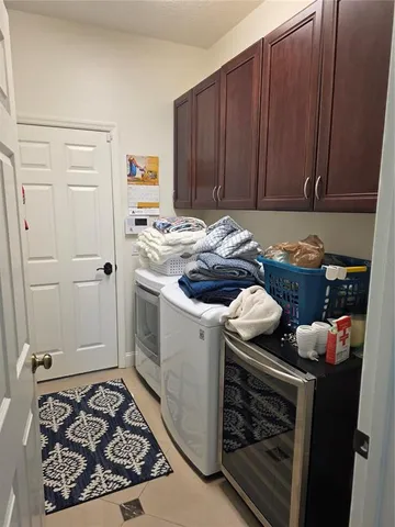 a kitchen with a stove and cabinets