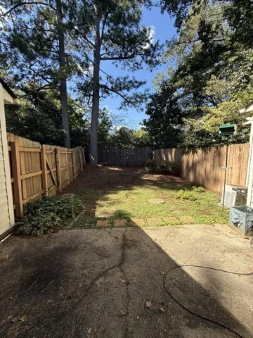 a view of swimming pool with a yard
