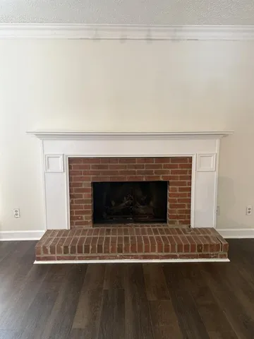a living room with a fireplace