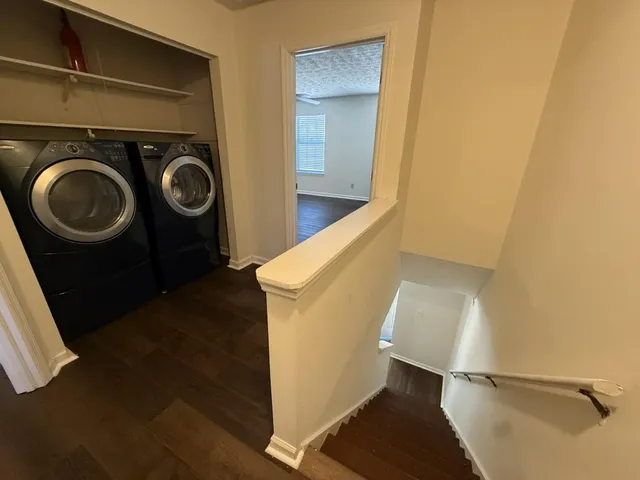 a utility room with dryer and washer