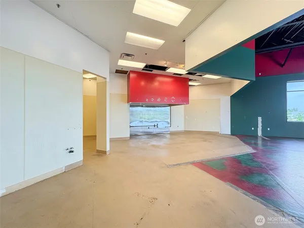 an empty room with a hallway