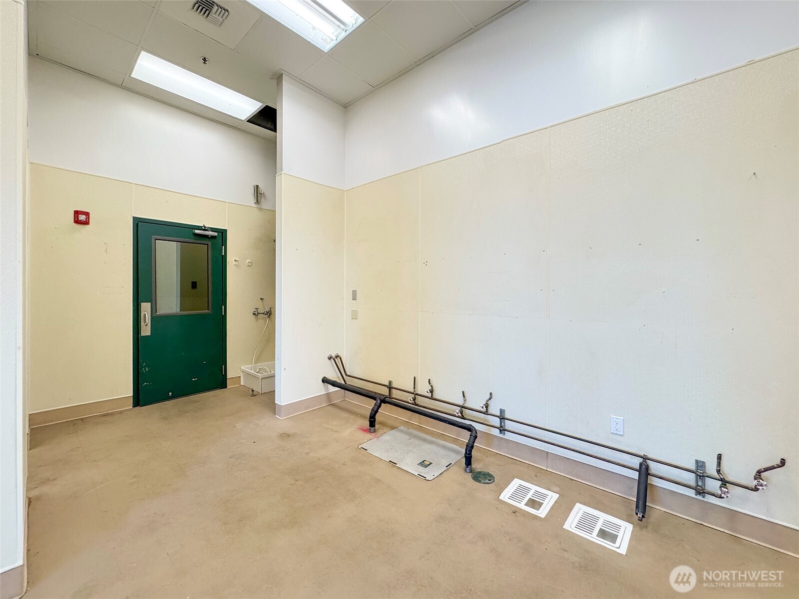 1400 West Washington Street, Unit 101 Sequim, WA 98382 - Photo 15 of 28 a view of a room with gym equipment