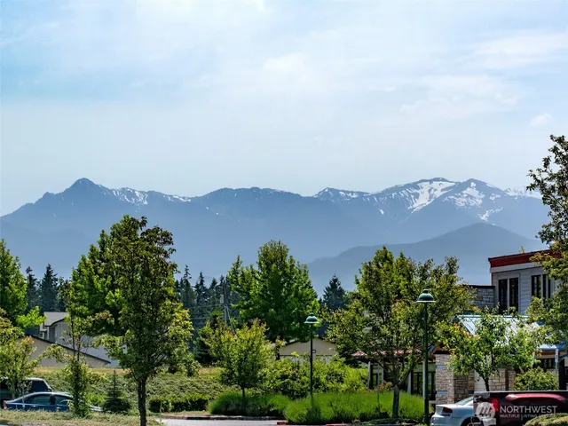 an aerial view of a city with lots of residential buildings