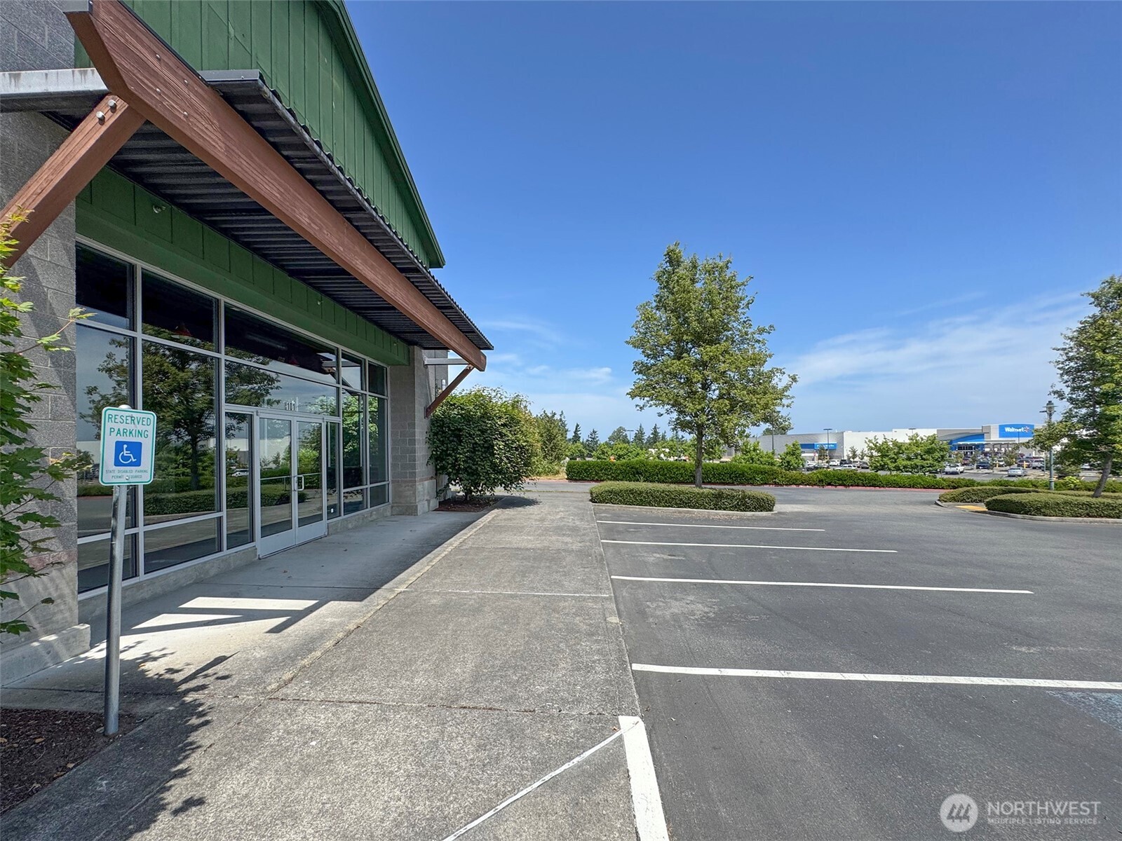 1400 West Washington Street, Unit 101 Sequim, WA 98382 - Photo 3 of 28 a view of a basketball court