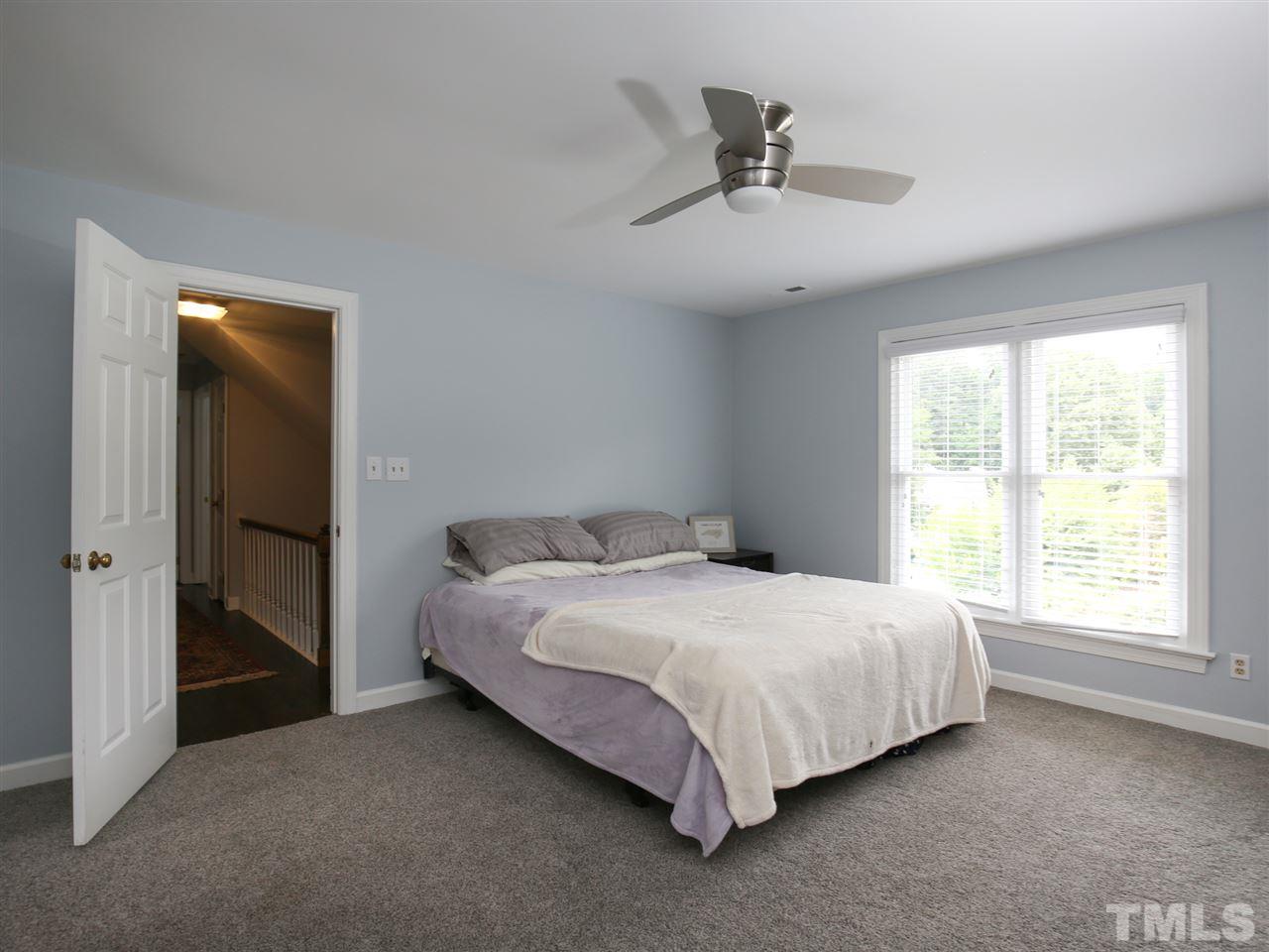 2116 Osprey Circle Raleigh, NC 27615 - Photo 16 of 25 New carpets, new paint, new blinds, and new lighting!