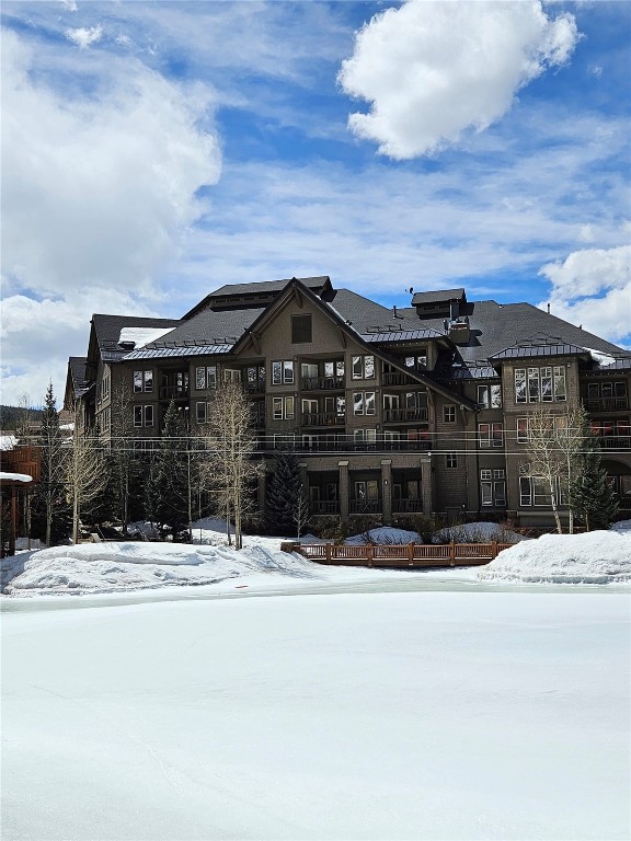 172 Copper Circle, Unit 107 Copper Mountain, CO 80443 - Photo 1 of 25 a view of a house with a snow on the road