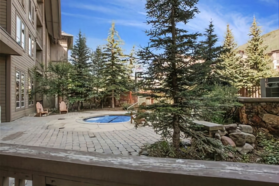 172 Copper Circle, Unit 107 Copper Mountain, CO 80443 - Photo 22 of 25 a view of a yard and car parked