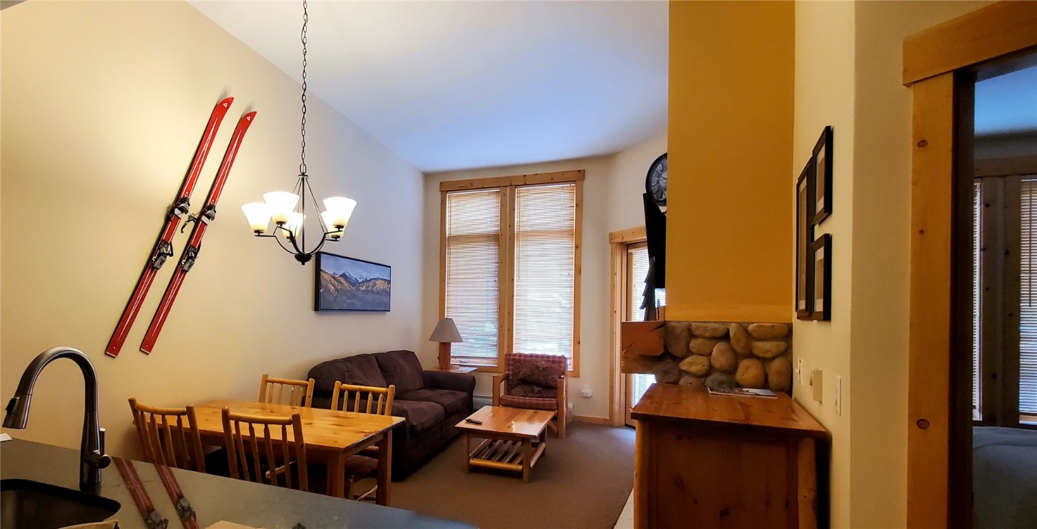 172 Copper Circle, Unit 107 Copper Mountain, CO 80443 - Photo 5 of 25 a living room with furniture and a flat screen tv