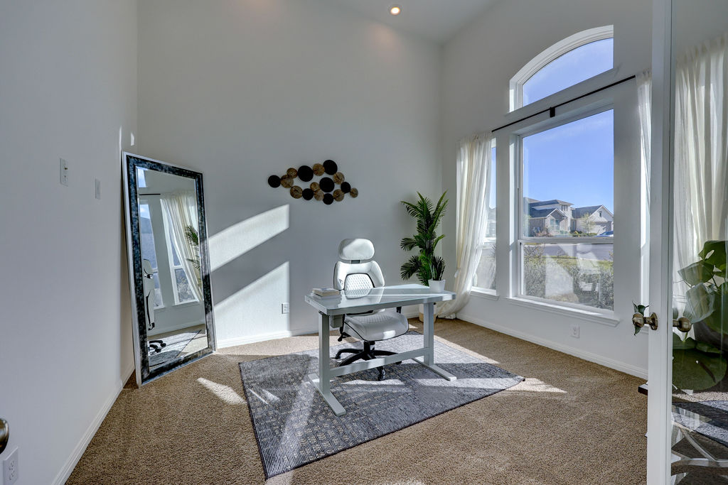 351 Pigeon River Road Kyle, TX 78640 - Photo 5 of 40 Office space with a high ceiling and light colored carpet
