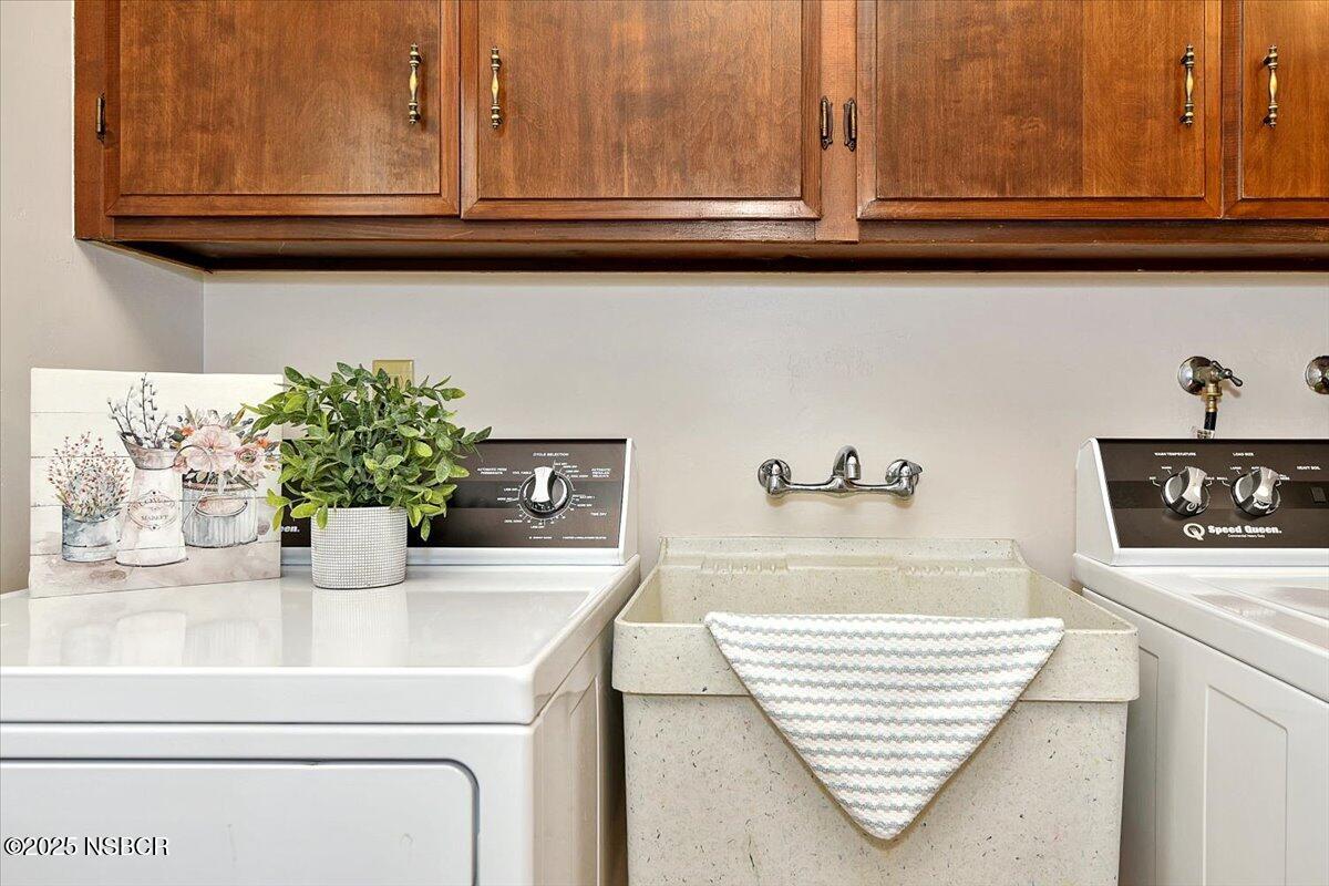 1740 Tularosa Road Lompoc, CA 93436 - Photo 28 of 55 a kitchen with a sink and cabinets